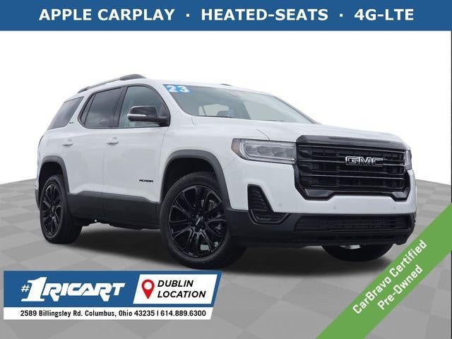2023 GMC Acadia SLE in Summit White — front three-quarter view